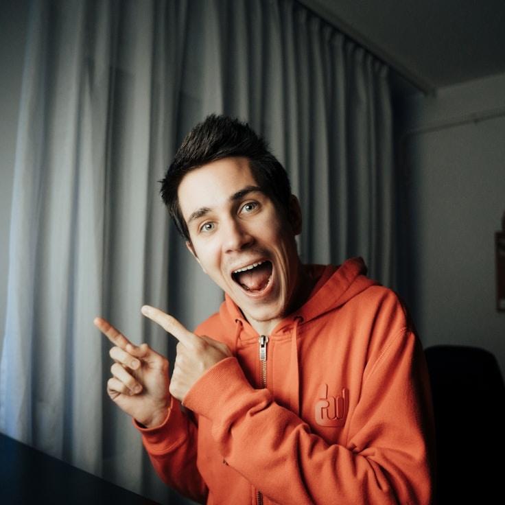 J. Lee, Client Relations Director, discussing corporate gifting strategy with business clients